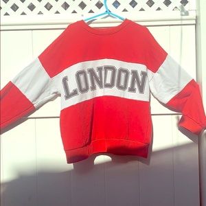 a cute sweater that has been worn once